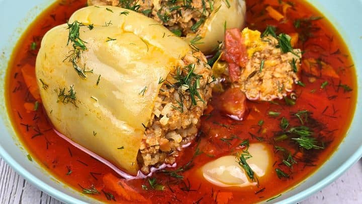 Hungarian Stuffed Peppers-Served in Bowl With Sour Cream Hungarian Stuffed Peppers Served In Green Bowl