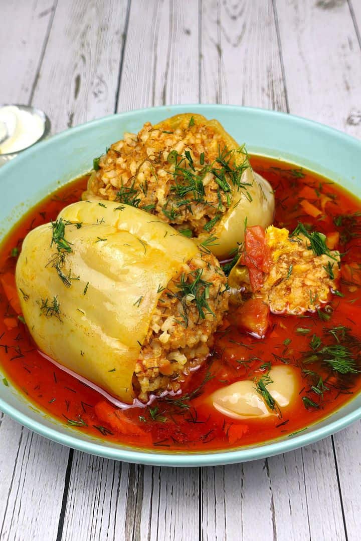 Hungarian Stuffed Peppers Served In Bowl With Sour Cream