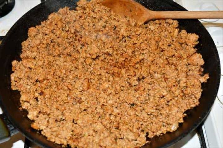 Turkey Lasagna With White Sauce-Fried Meat Filling in the Frying Pan Cooked savory minced turkey filling simmering gently in a frying pan.