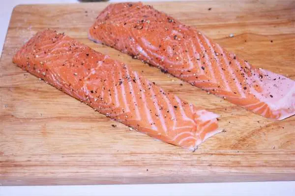 Air Fryer Teriyaki Salmon-Seasoned Salmon Fillets on Chopping Board