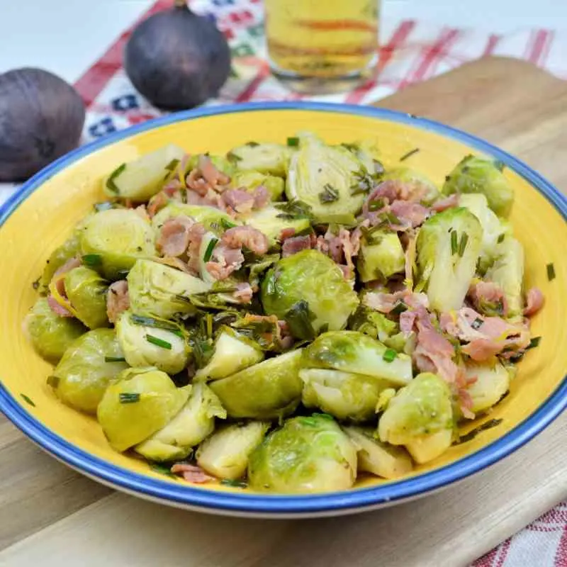 Brussels Sprouts With Lemon-Served in the Bowl on the Chopping Board