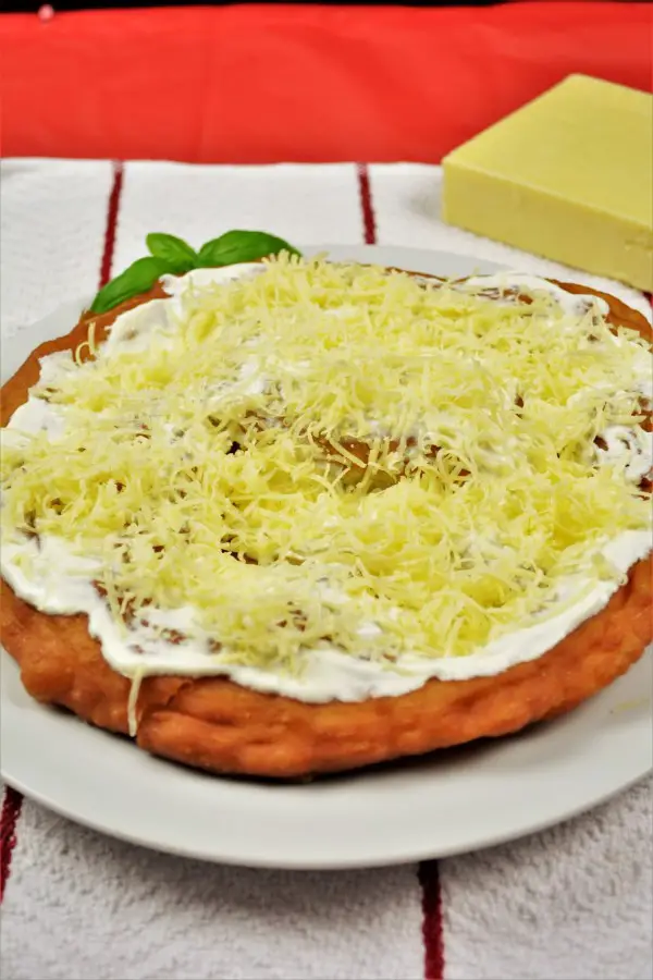 Homemade Fried Dough Recipe-Served With Sour Cream and Grated Cheese