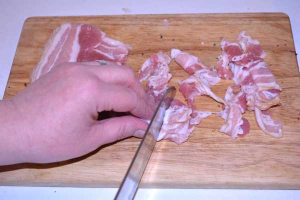 Hungarian Mushroom Paprikash-Chopping the Smoked Bacon on Chopping Board