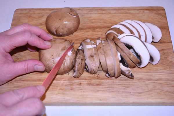 Hungarian Mushroom Paprikash-Slicing the Mushrooms on Chopping Board