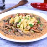 Authentic Hungarian Mushroom Paprikas (Gombapaprikás) served over penne pasta
