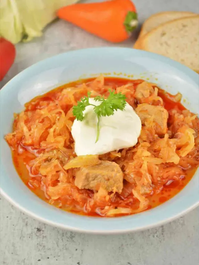 cropped-Pork-and-Sauerkraut-Goulash-Served-on-Plate-With-Sour-Cream-on-Top2.jpg