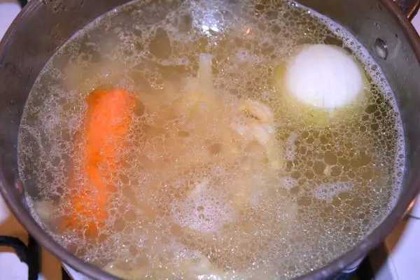 Tripe Soup Recipe-Boiling Frozen Tripe With Onion and Carrot in the Pot