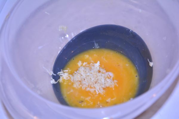 Tripe Soup Recipe-Egg Yolks and Grated Garlic in the Bowl