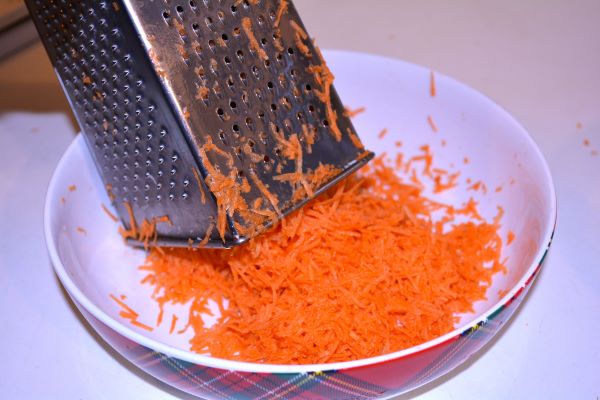 Tripe Soup Recipe-Grating the Carrots in the Bowl