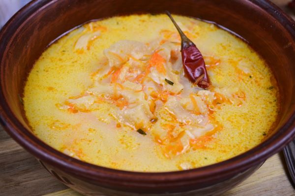 Tripe Soup Recipe-Tripe Soup Served in the Bowl With Sour Cream and Jared Chilli Pepper