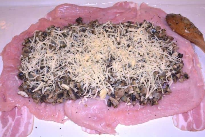 Stuffed Turkey Tenderloin Recipe-Grated Cheddar Cheese on the Sautéed Mushrooms Freshly grated sharp cheddar cheese scattered over sautéed mushrooms before rolling.