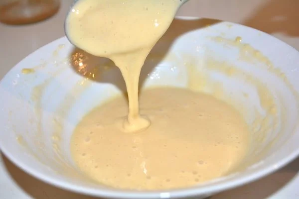 Hungarian Tomato Soup-Fluid Batter From Egg and Flour in the Bowl