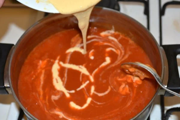 Hungarian Tomato Soup-Pouring the Batter in the Tomato Soup