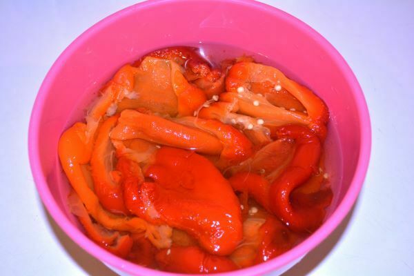 Marinated Roasted Red Peppers-Roasted Red Bell Peppers Marinating in the Bowl