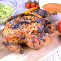 Cosori Air Fryer Whole Chicken-Served on the Chopping Board
