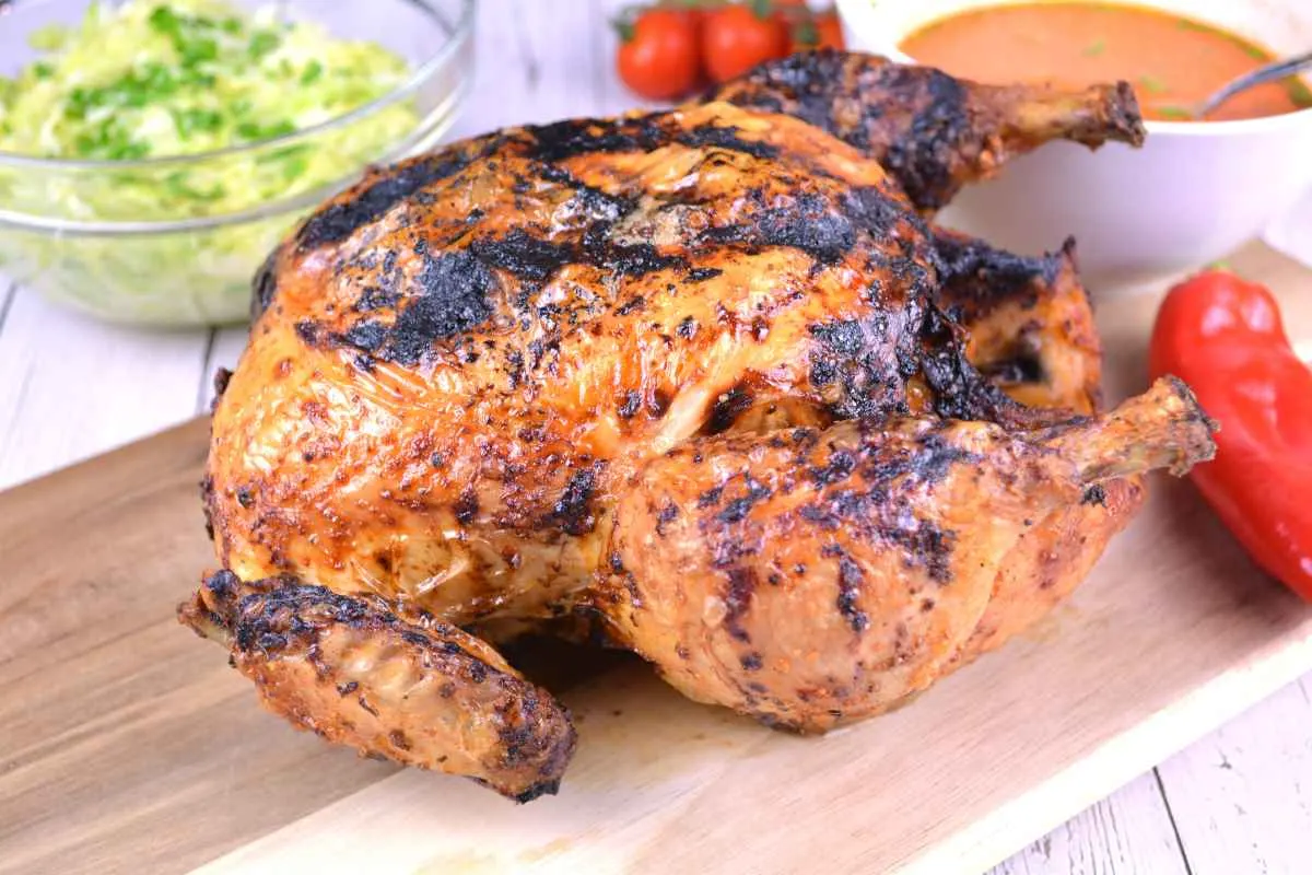 Cosori Air Fryer Whole Chicken-Served on the Chopping Board With Cabbage Salad
