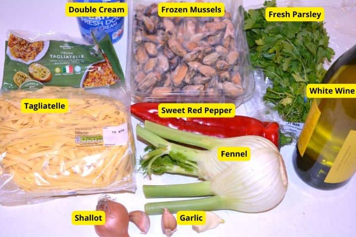 Frozen Mussels Recipe-Tagliatelle, Cooked Mussels, Double Cream, White Wine, Parsley, Red Pepper, Fennel, Shallot and Garlic Cloves Frozen Mussels Recipe Ingredients on the Table