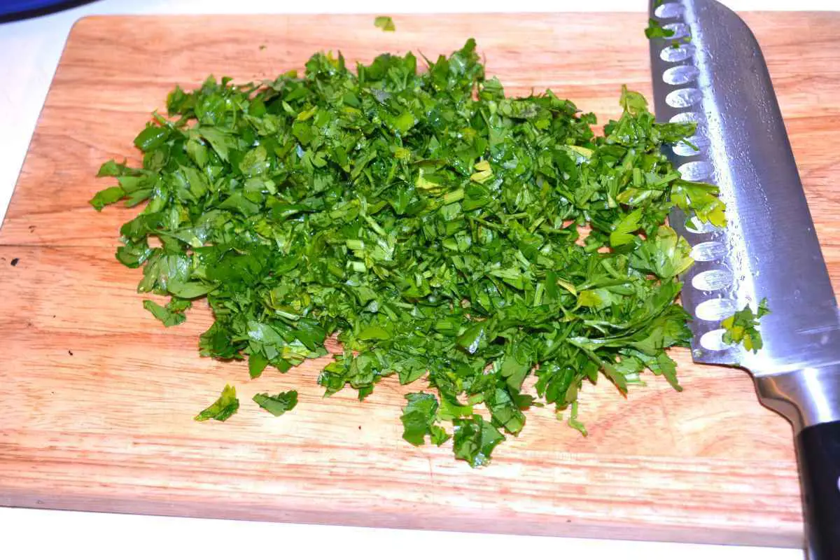 Mushroom Salad With Mayonnaise-Chopped Parsley on the Chopping Board