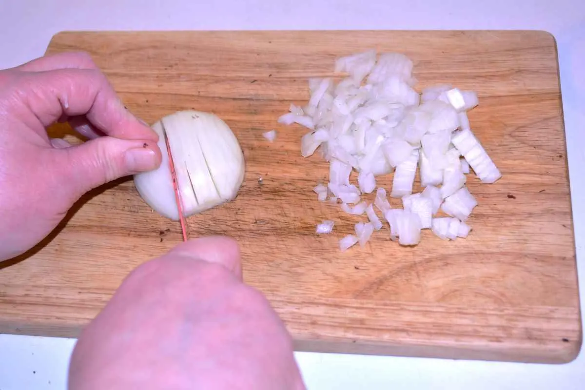 Mushroom Salad With Mayonnaise-Chopping Onion on the Chopping Board