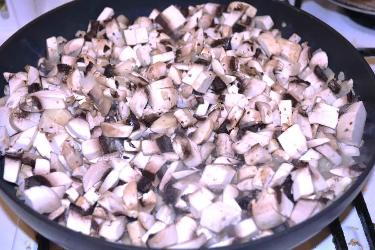 Mushroom Salad With Mayonnaise-Frying Mushrooms and Onion in the Pan
