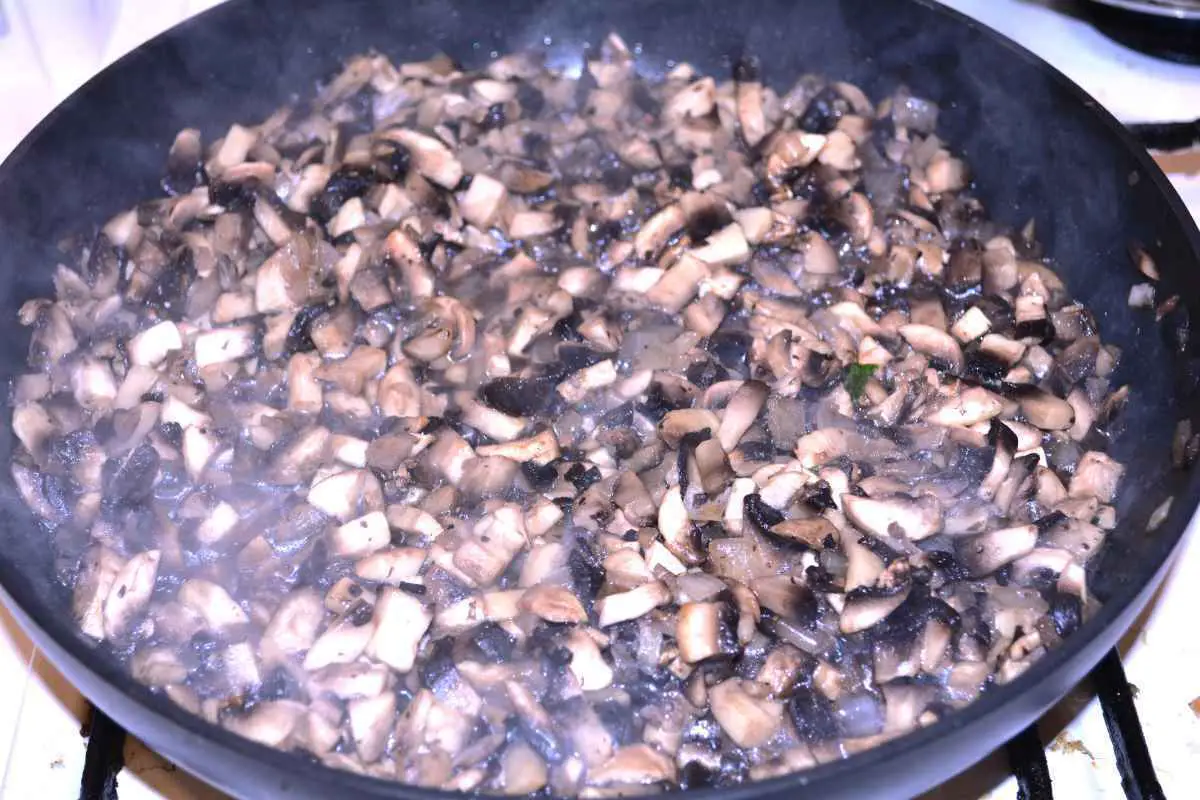 Mushroom Salad With Mayonnaise-Sautéed Mushrooms and Onion in the Pan