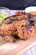 Crispy Air Fryer Whole Chicken Served on the Chopping Board