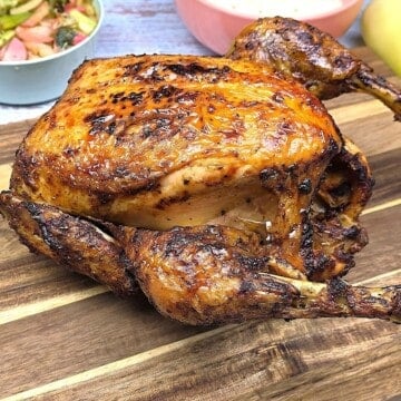 Crispy Air Fryer Whole Chicken Served on the Chopping Board