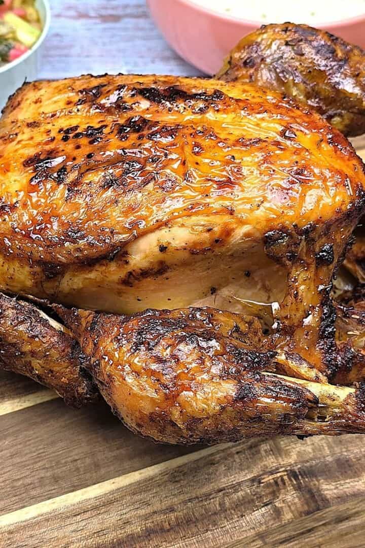 Crispy Air Fryer Whole Chicken Served on the Chopping Board