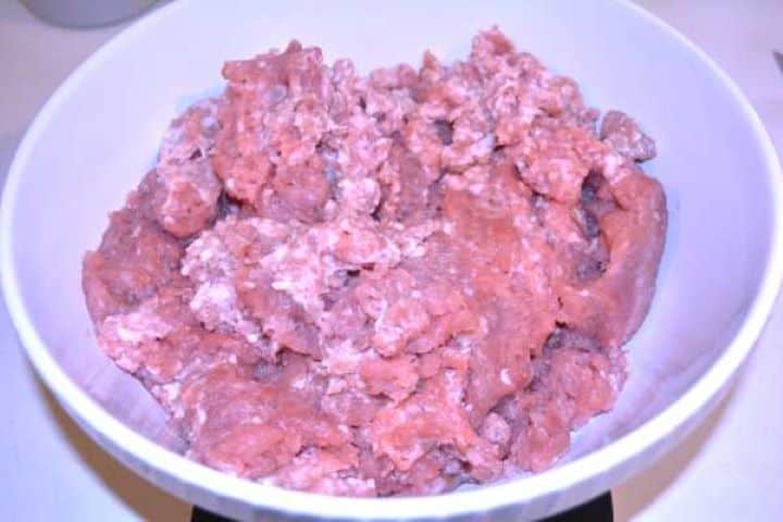 Mince Meat Fresh minced pork and minced turkey combined in a glass mixing bowl for homemade skinless sausages.