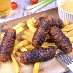 Skinless Sausages-Served With Fries on the Chopping Board