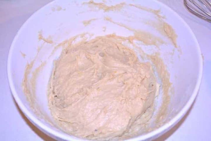 Dough Smooth and elastic kneaded doughnut dough ball resting in a mixing bowl before rising.