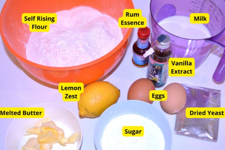Ingredients Baking ingredients for air fryer doughnuts from scratch including flour, milk, yeast, egg yolks, butter, and lemon.