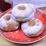 Air Fryer Doughnuts From Scratch-Served on Red Plate With Sugar on Top