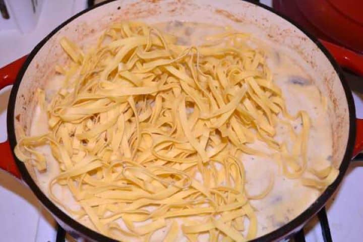 Noodles Egg Noodles on the Sautéed Mushrooms in the Pan