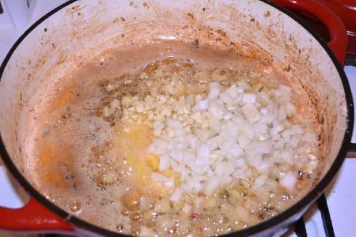 Fry Onion Frying Chopped Onion and Garlic in the Deep Pan