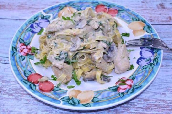 Serve Creamy Chicken and Mushroom Alfredo Served on Blue Plate