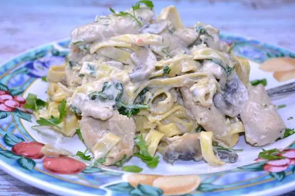Chicken and Mushroom Alfredo-Served on Fruit Coloured Plate