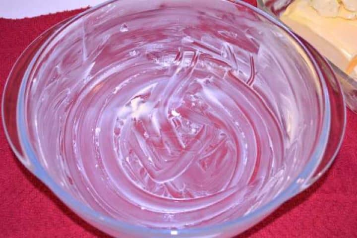 Casserole Dish Round glass baking dish thoroughly greased with softened butter.
