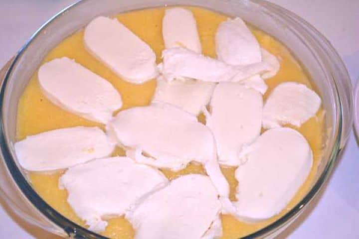 Second Layer Mozzarella Second layer of polenta smoothed into the dish and topped with remaining mozzarella slices.