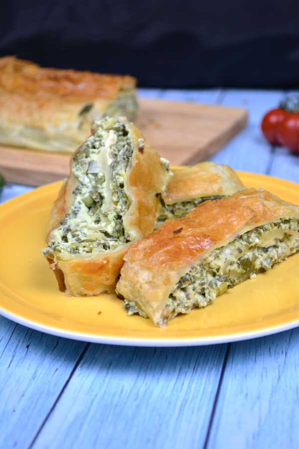 Spinach and Feta Rolls-Three Rolls Served on Yellow Plate