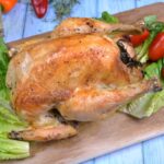 Roasted Free Range Chicken-Served on Chopping Board With Lettuce Leaves