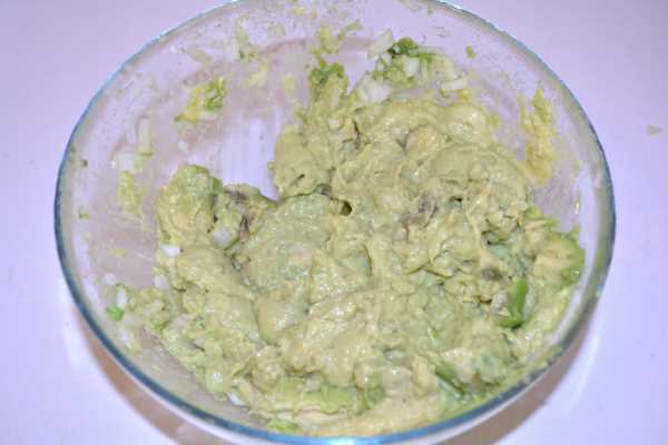 Vegan Guacamole-Mashed Avocado and Onion in the Bowl
