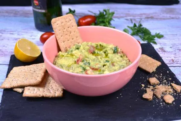 Vegan Guacamole-Served in Pink Bowl With Crackers