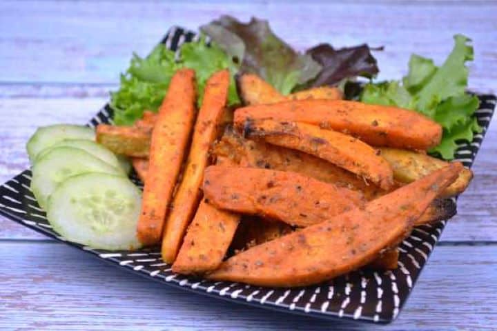 Serve Air Fryer Sweet Potato Wedges Served on the Plate With Cucumber and Lettuce