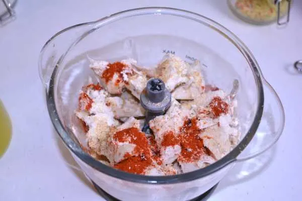 Chicken Salami Recipe-Cut Chicken Breast and Rest of Ingredients in the Electric Chopper