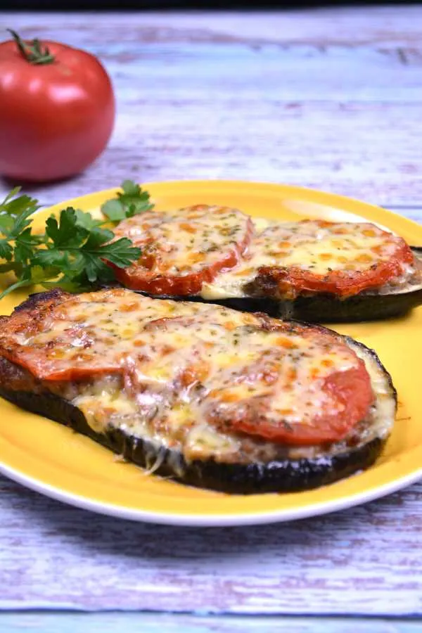 Eggplant With Minced Pork-Two Slices With Parsley Served on the Yellow Plate