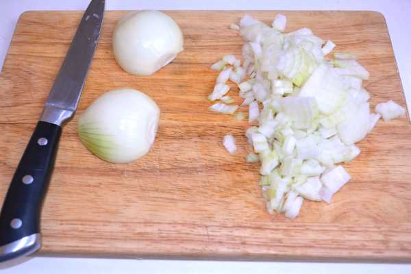 Hungarian Beef Paprikash-Chopped Onions on Chopping Board