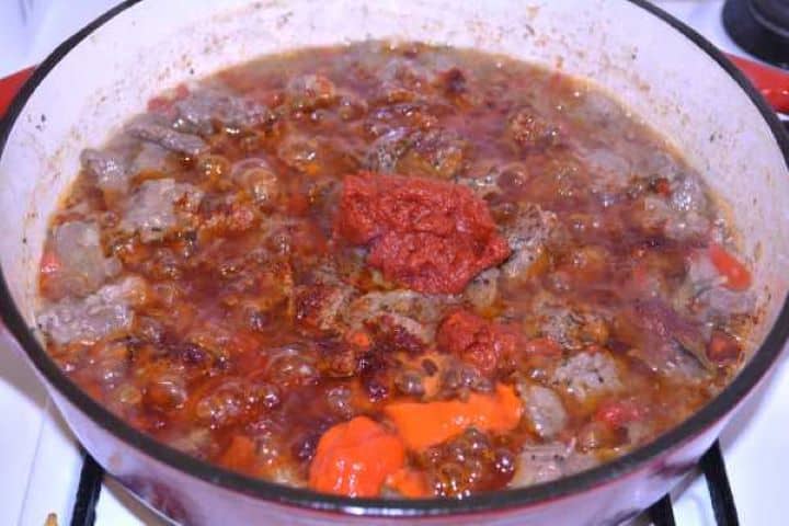 Seasoning Beef cubes coated in sweet Hungarian paprika, tomato puree, and goulash paste.