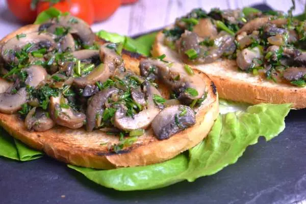 Vegan Garlic Mushrooms-Served on the Plate With Lettuce and Tomatoes