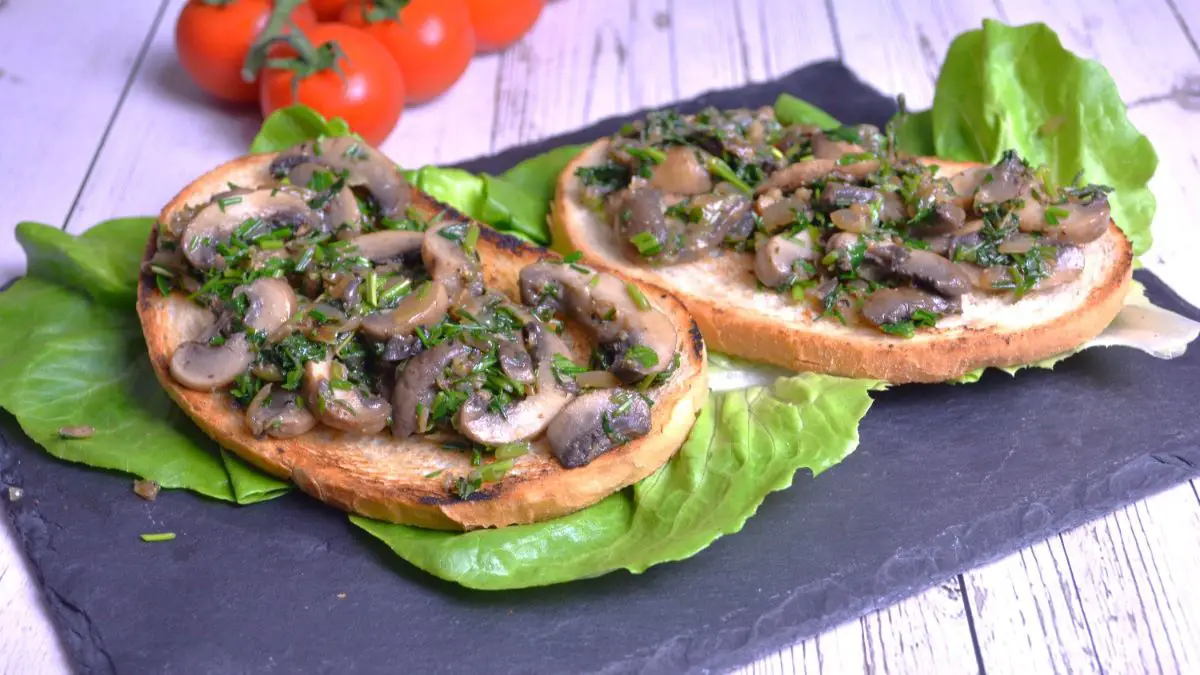 Vegan Garlic Mushrooms-Served on the Plate With Lettuce and Tomatoes